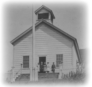 Children on the steps of Seaside School, early 1900s